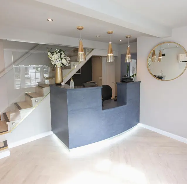 Reception desk and staircase at York House Dental Practice